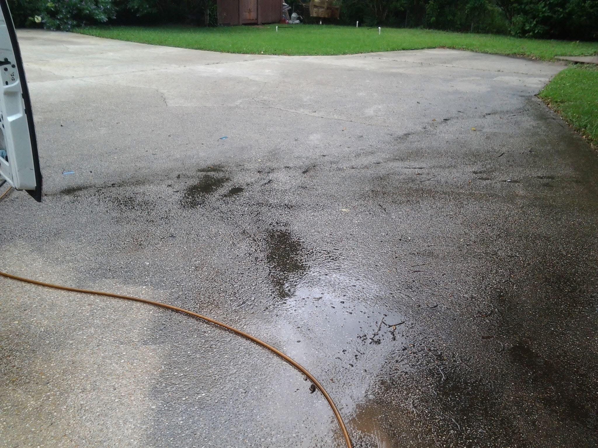 Power washing concrete driveway